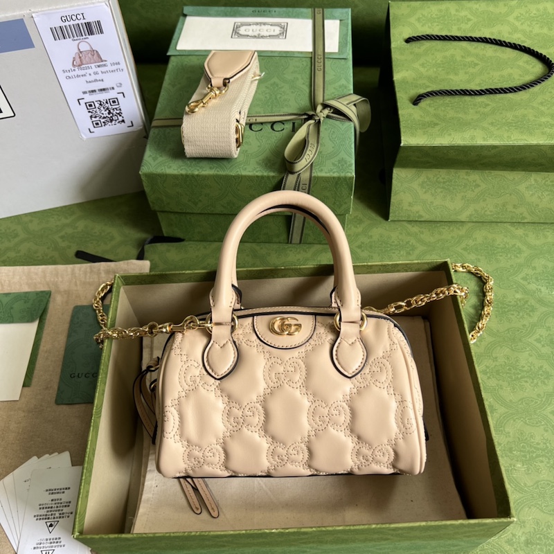 Gucci GG matelassé leather top handle bag beige ‎702251