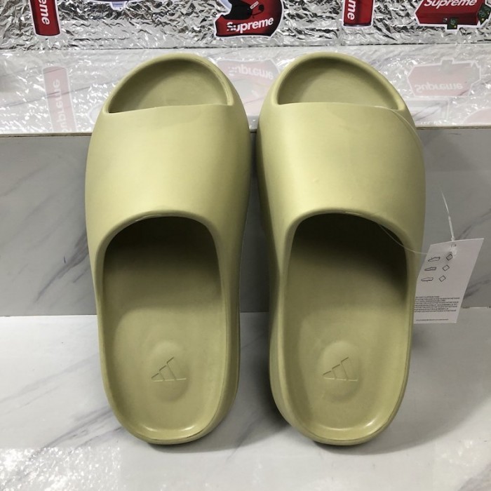 real and fake yeezy slides